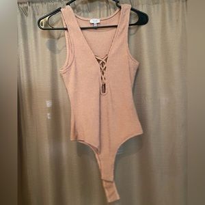 Tobi mauve pink bodysuit. Size small, never worn.